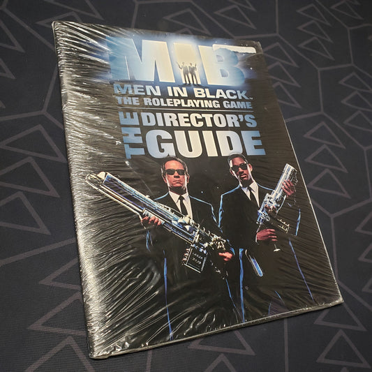 Image shows the front cover of the Director's Guide book for the roleplaying game Men in Black