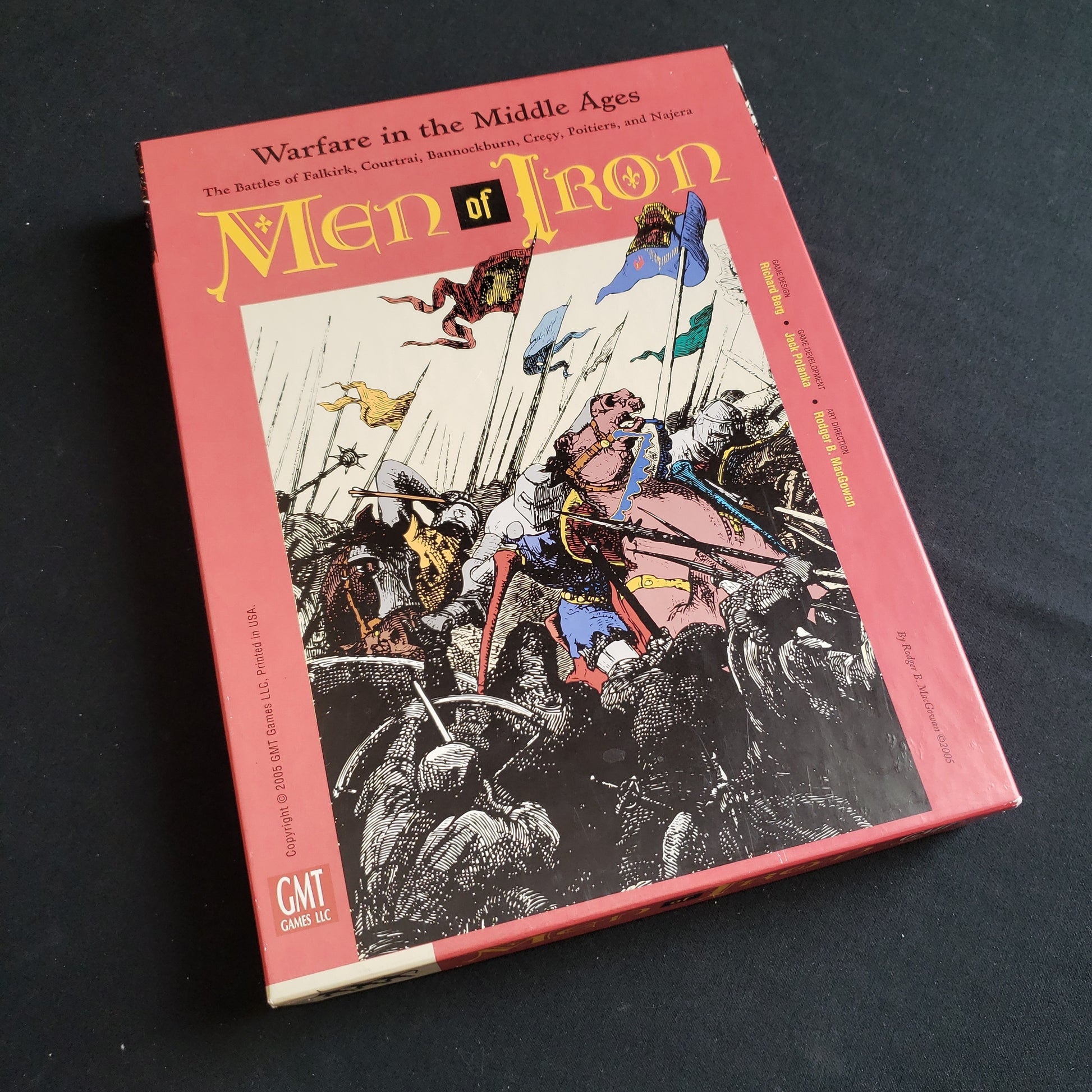 Image shows the front cover of the box of the Men of Iron board game