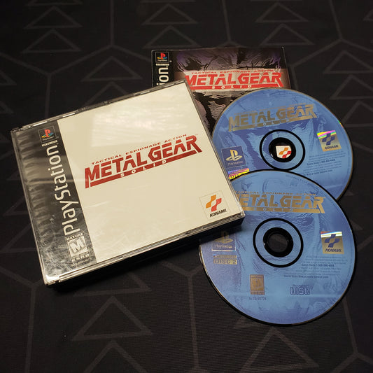 Image shows the jewel case with manual and two discs for the video game Metal Gear Solid for Playstation 1