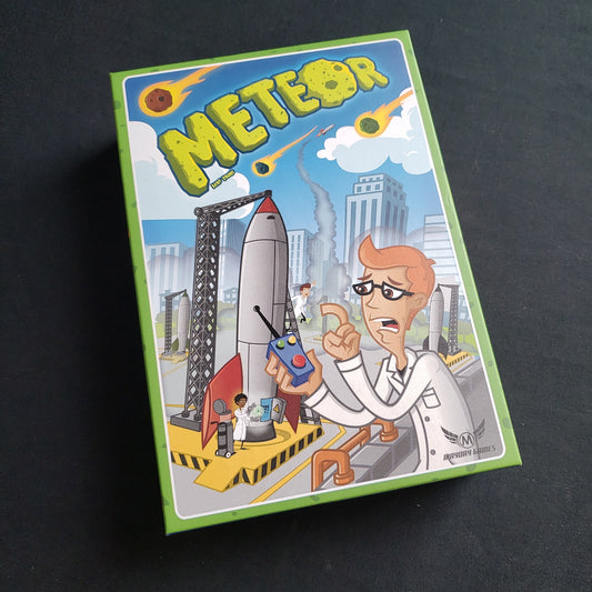 Image shows the front cover of the box of the Meteor card game