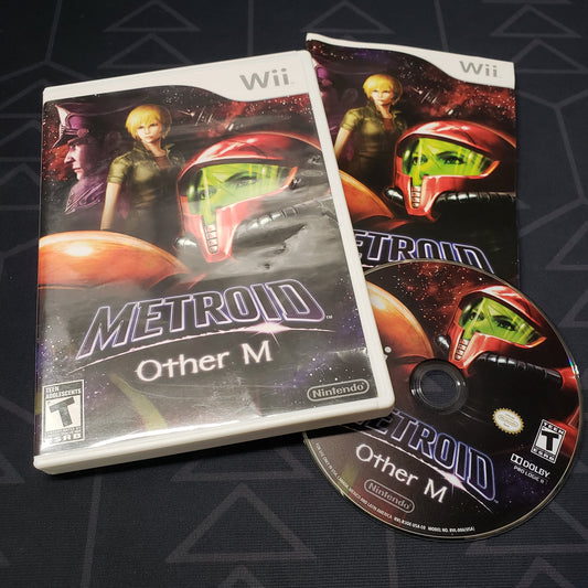 Image shows the case, manual and disc for the video game Metroid: Other M for Nintendo Wii