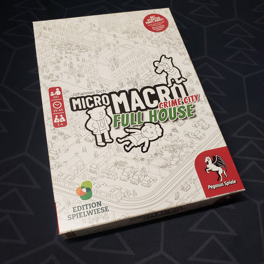 Image shows the front cover of the box of the MicroMacro Crime City: Full House board game