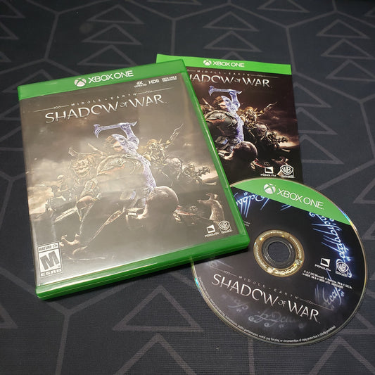 Image shows the case, manual and disc for the video game Middle-Earth: Shadow of War for Xbox One