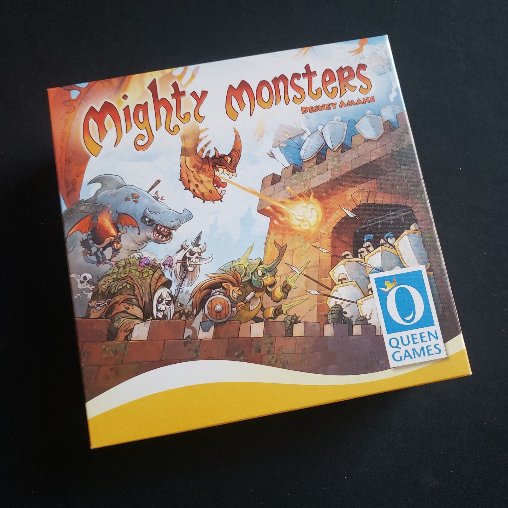 Image shows the front cover of the box of the Mighty Monsters card game