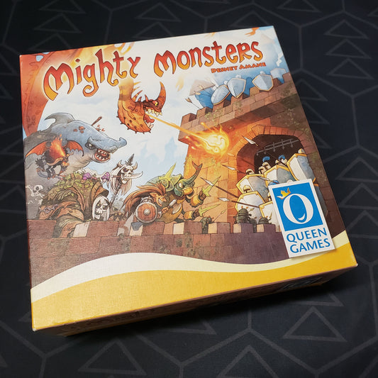 Image shows the front cover of the box of the Mighty Monsters card game