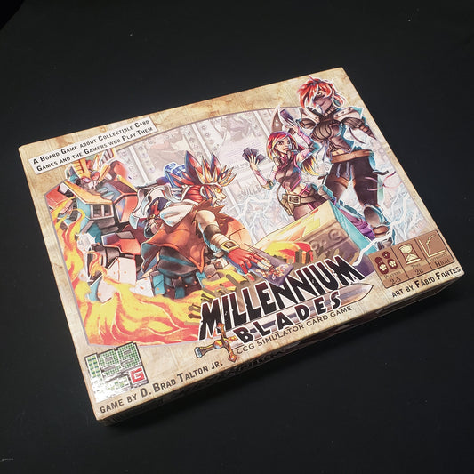 Image shows the front cover of the box of the Millennium Blades card game