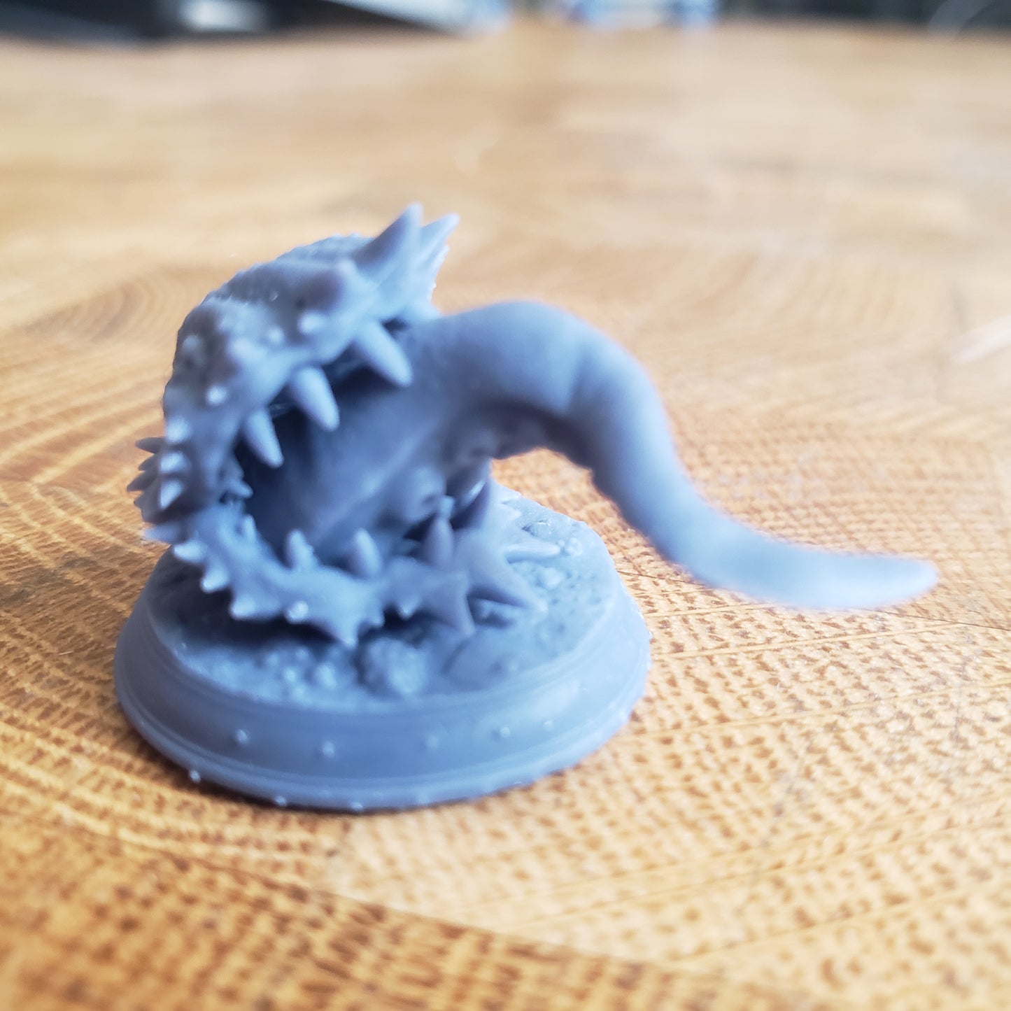 Image is a photo of a 3D printed attacking clam mimic gaming miniature printed in-house at All Systems Go