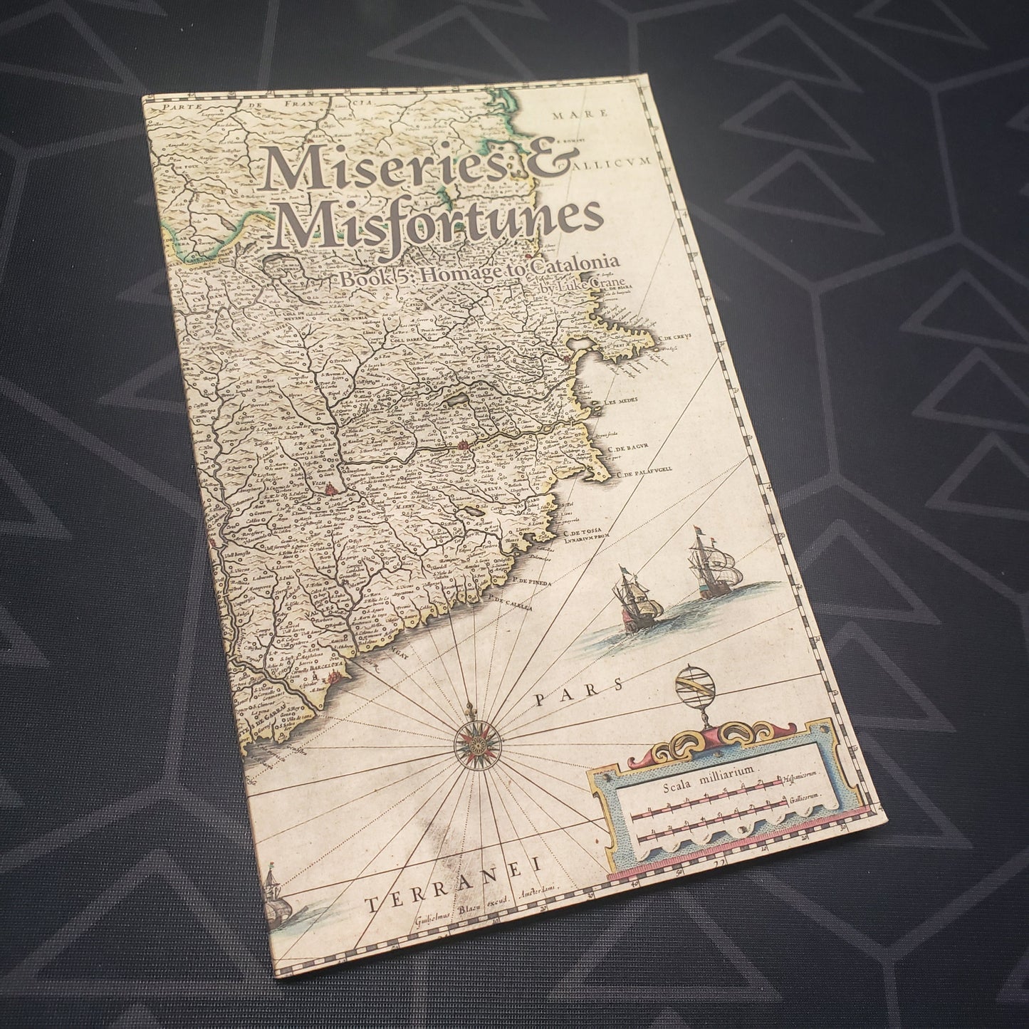 Image shows the front cover of the Homage to Catalonia book for the roleplaying game Miseries & Misfortunes