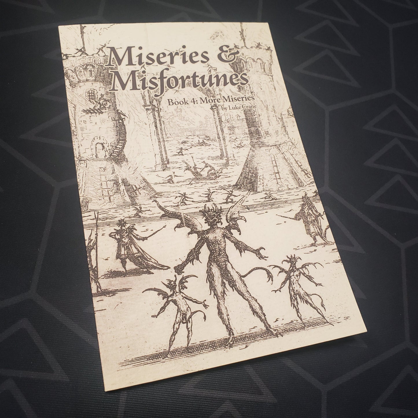 Image shows the front cover of the More Miseries book for the roleplaying game Miseries & Misfortunes