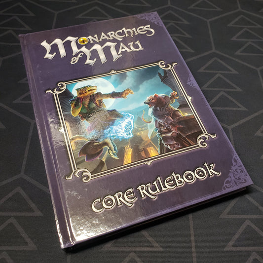 Image shows the front cover of the core rulebook for the roleplaying game Monarchies of Mau