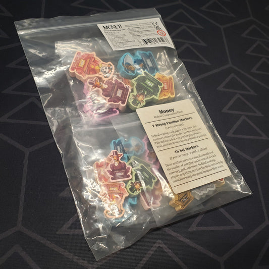 Image shows the front of the baggie for the 2025 Promo Upgrade Deluxe Components Pack for the board game Money!