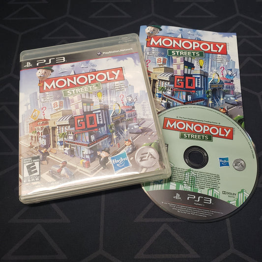 Image shows the case, manual and disc for the video game Monopoly Streets for Playstation 3