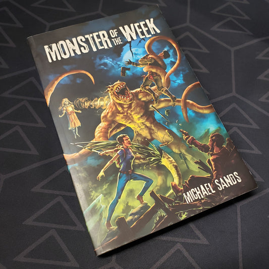 Image shows the front cover of the revised edition core rulebook for the roleplaying game Monster of the Week