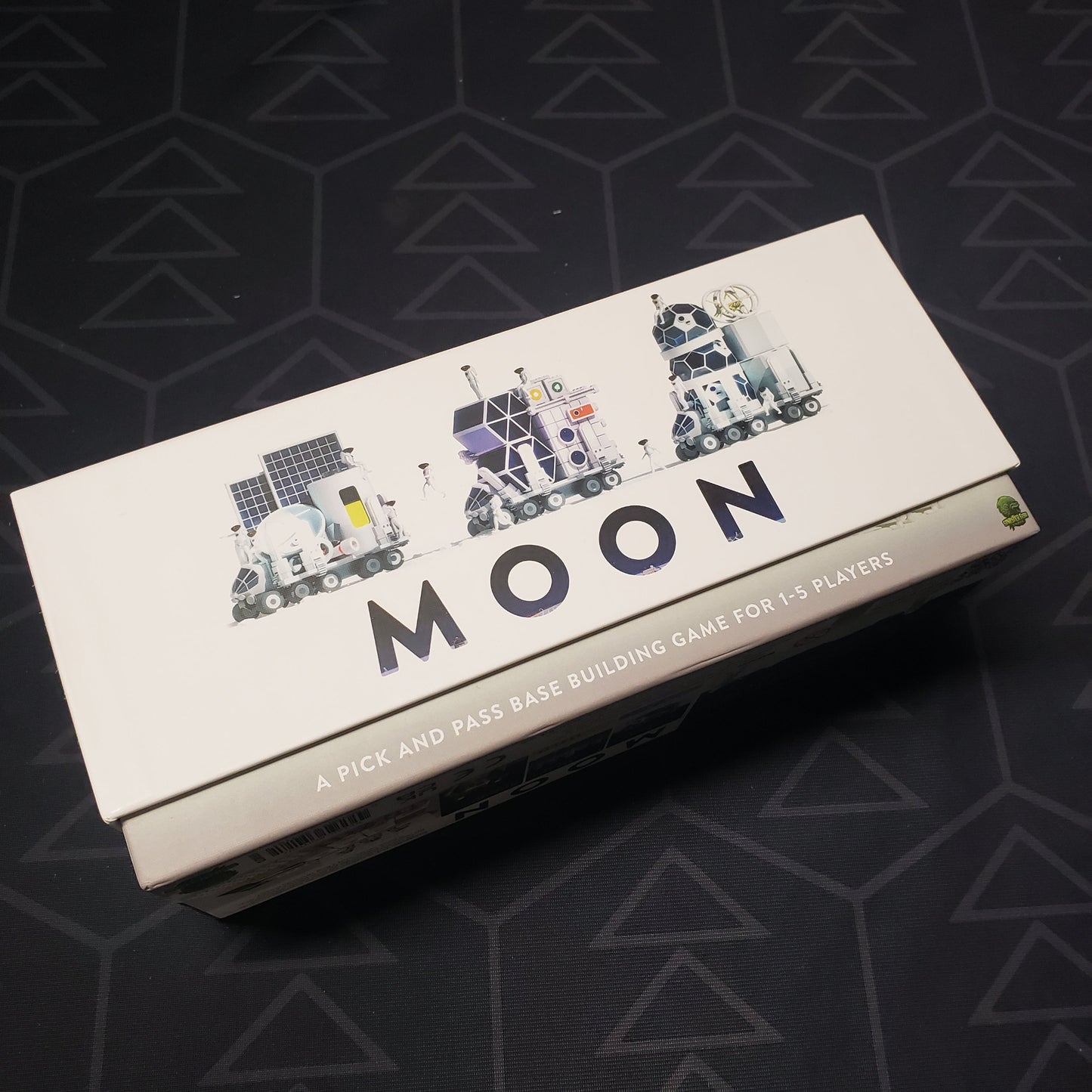Image shows the front cover of the box for the Moon board game