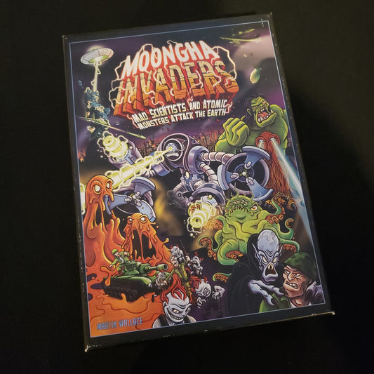 Image shows the front cover of the box of the Moongha Invaders board game