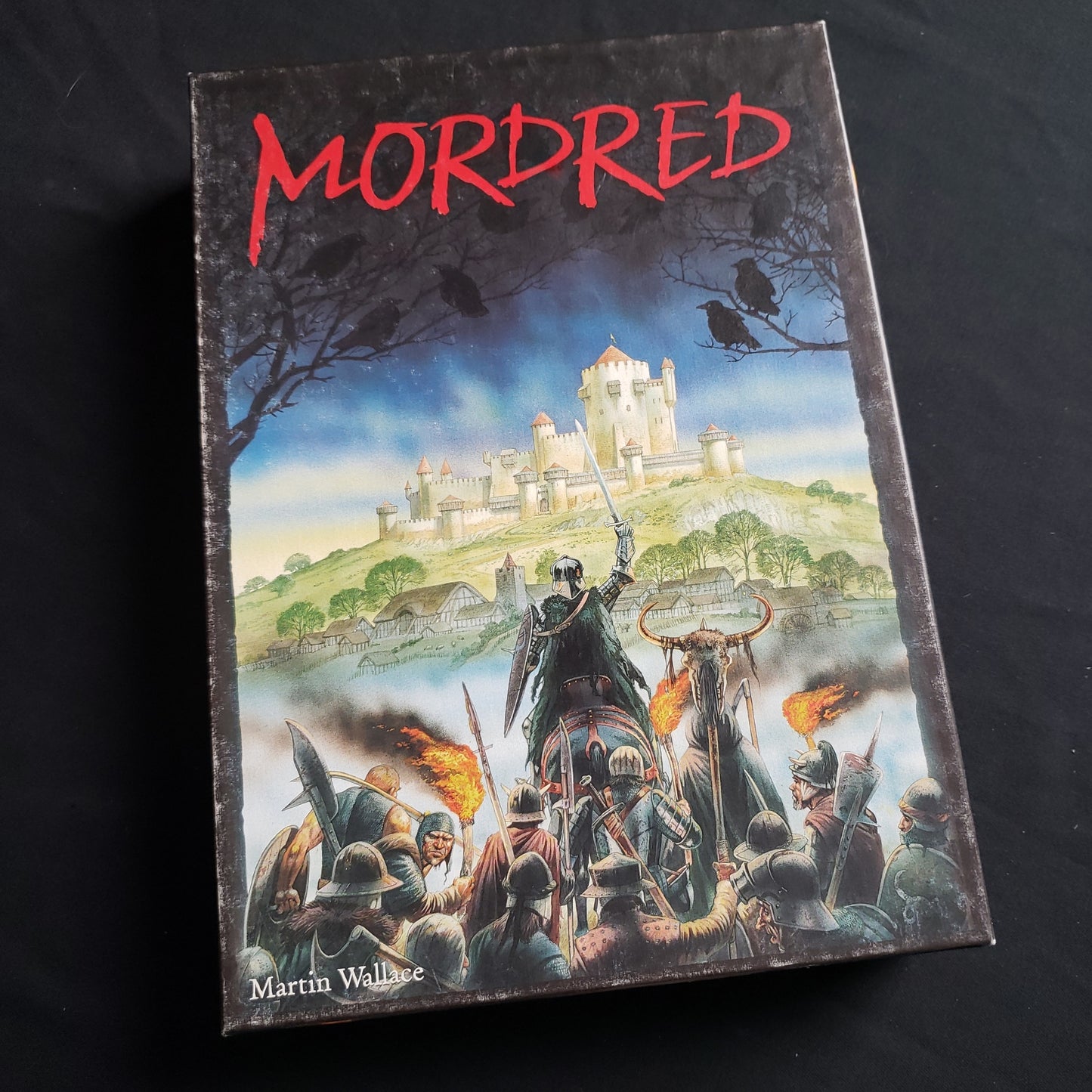 Image shows the front cover of the box of the Mordred board game