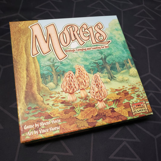 Image shows the front cover of the box for the Morels card game