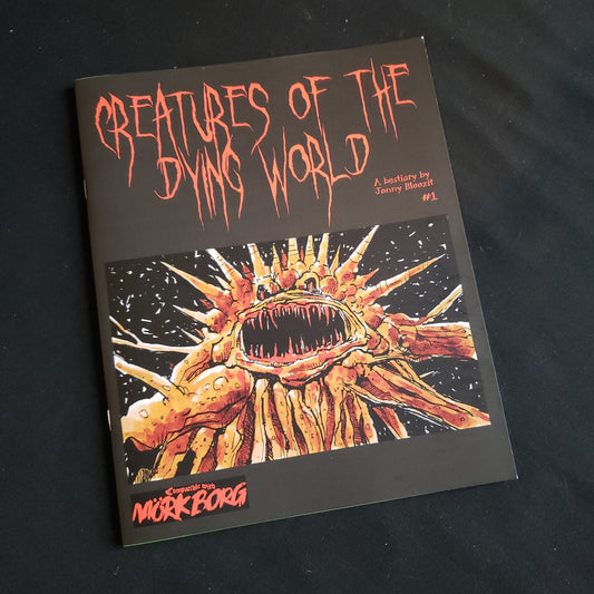 Image shows the front cover of the Creatures of the Dying World: Issue 1 book for the Mork Borg roleplaying game