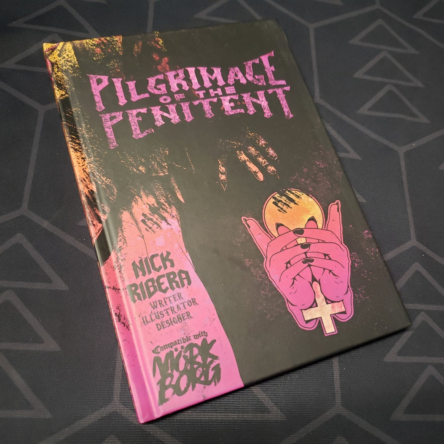 Image shows the front cover of the Pilgrimage of the Penitent book for the roleplaying game Mork Borg