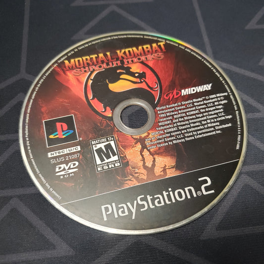 Image shows the label side of the game disc for the video game Mortal Kombat: Shaolin Monks for Playstation 2