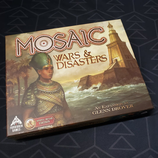 Image shows the front of the box for the Wars & Disasters expansion for the board game Mosaic