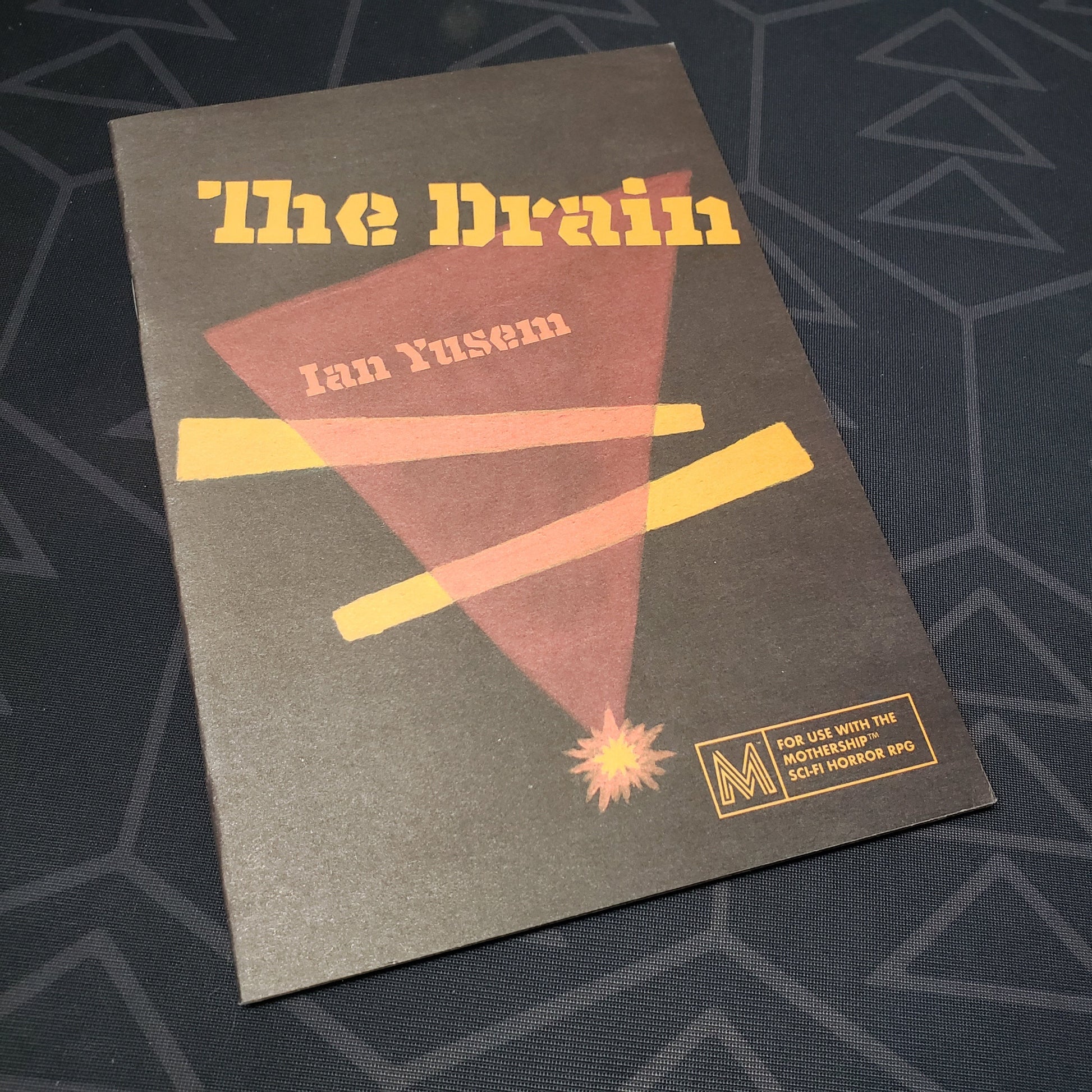 Image shows the front cover of The Drain book for the roleplaying game Mothership
