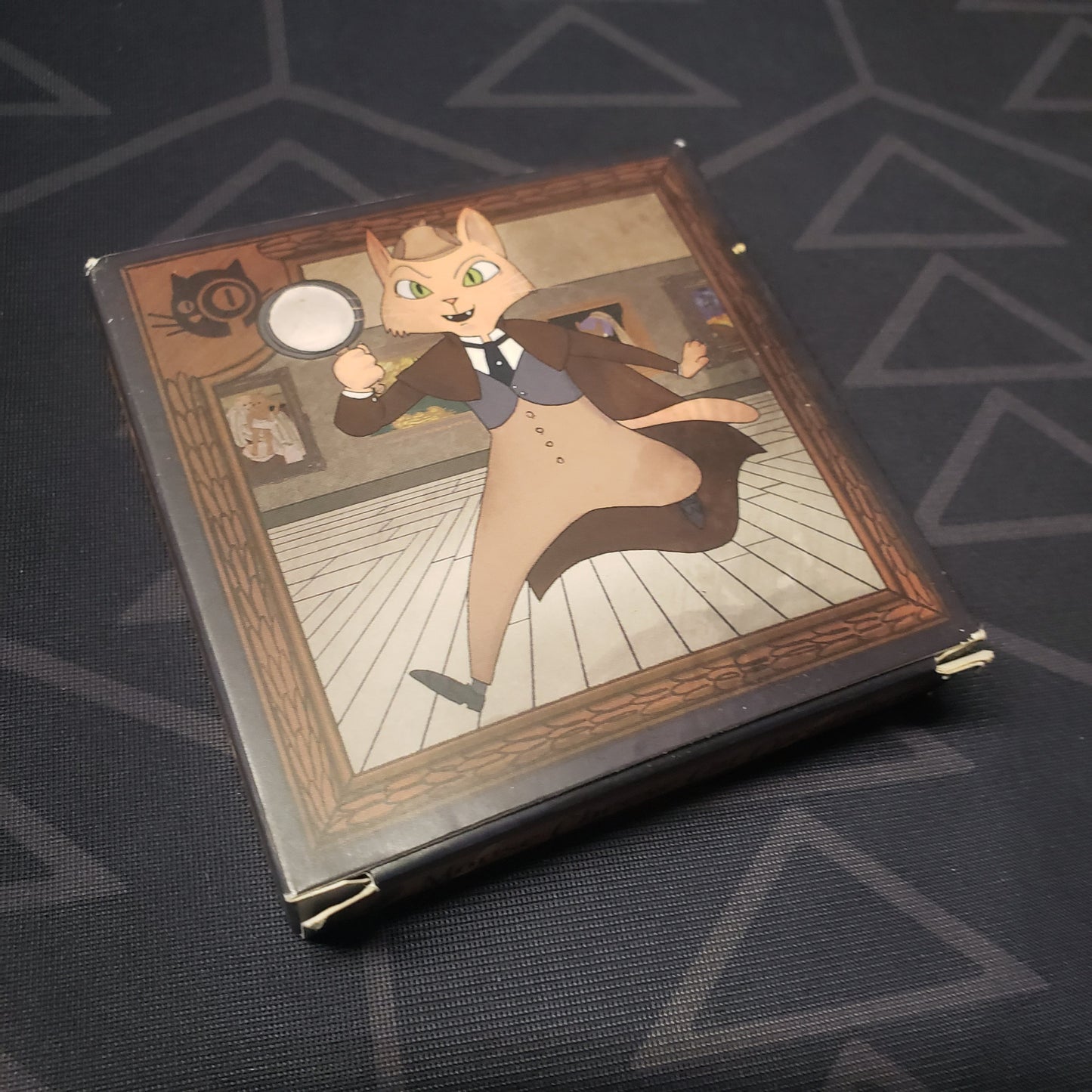 Image shows the front cover of the box for the Mouse Cheese Cat Cucumber card game