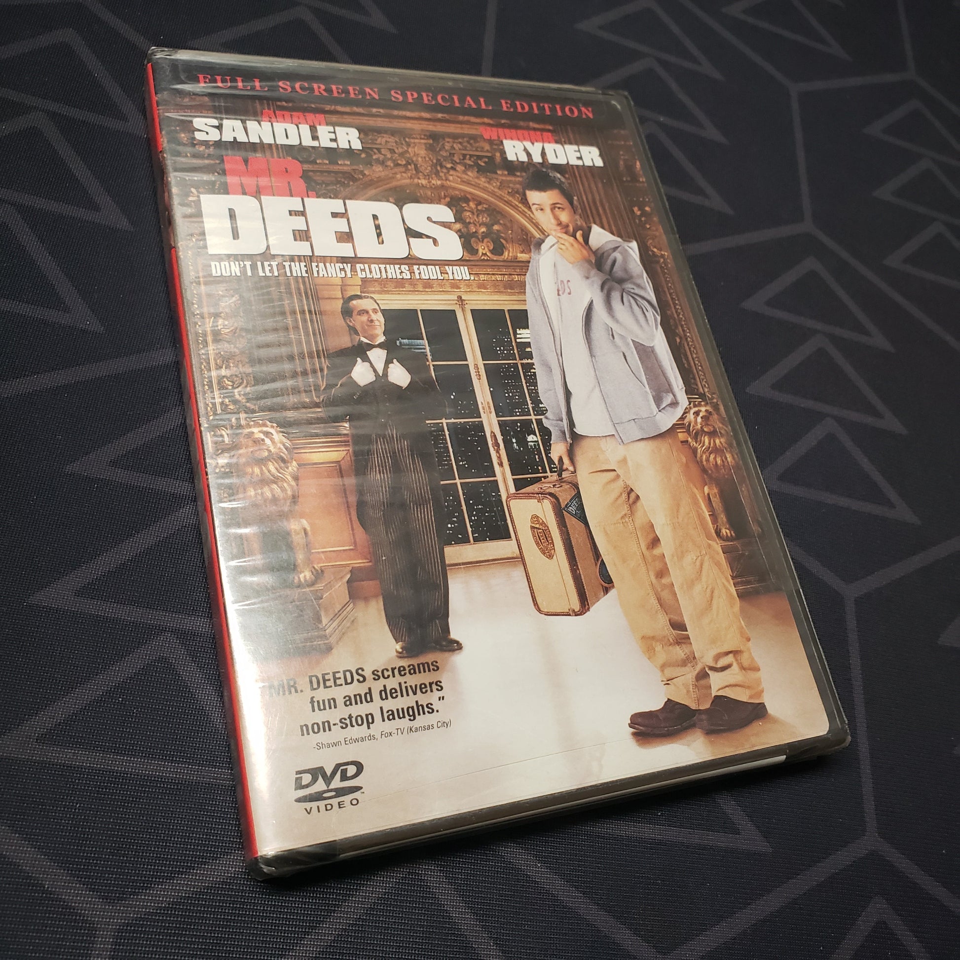 Image shows the front of the case for the movie Mr. Deeds on DVD