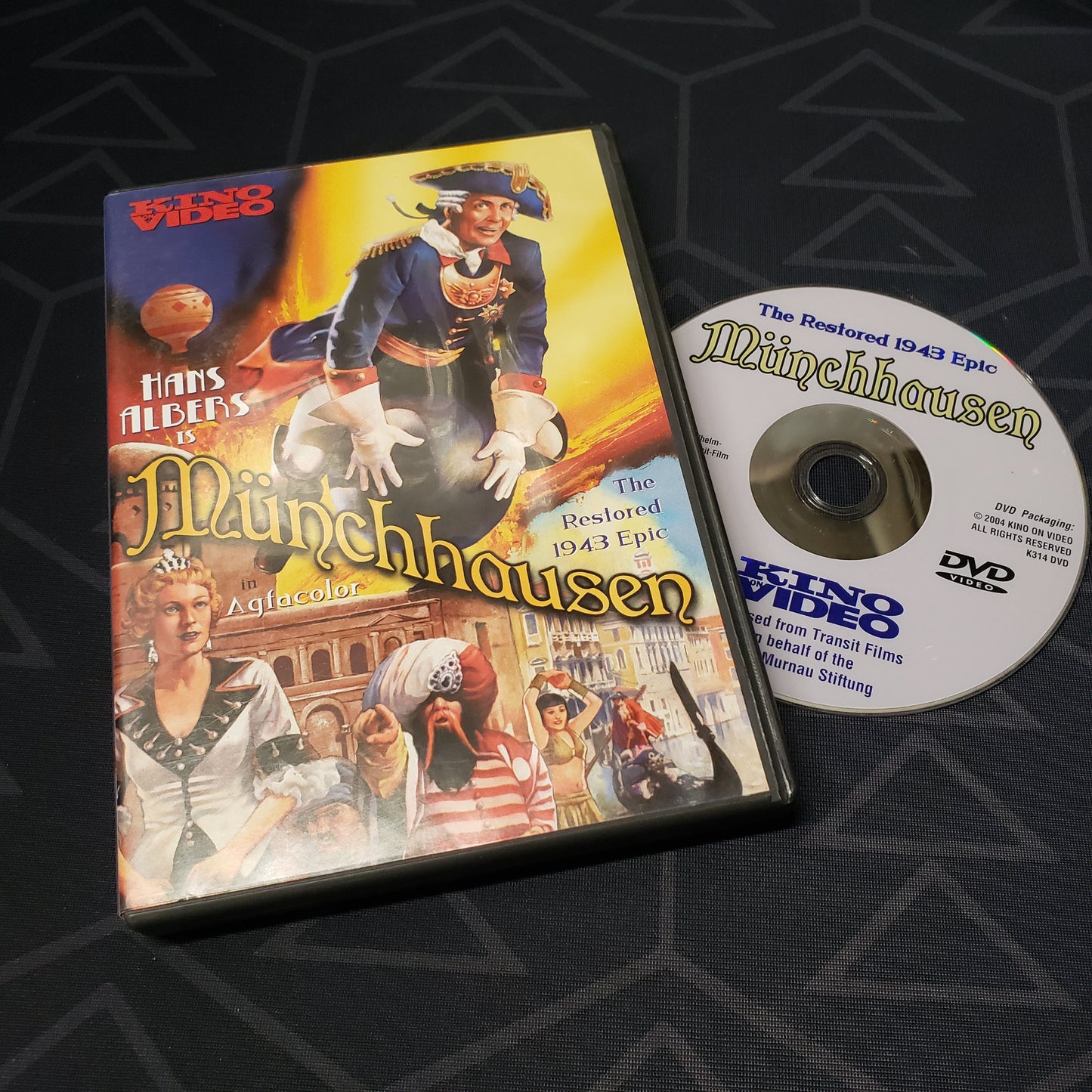 Image shows the case & disc for the movie Munchhausen on DVD