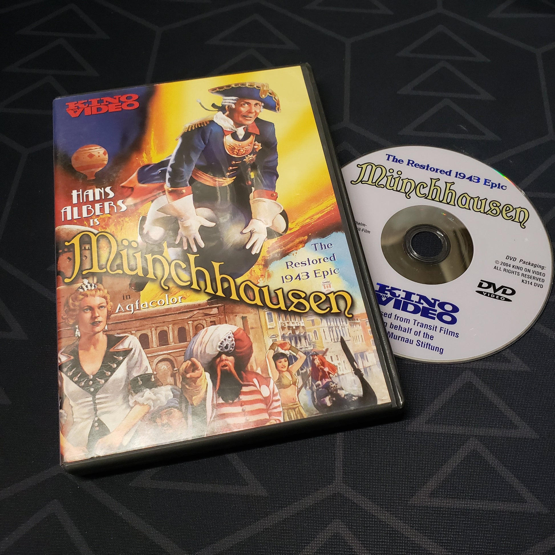Image shows the case & disc for the movie Munchhausen on DVD