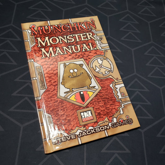 Image shows the front cover of the Munchkin: Monster Manual roleplaying game book