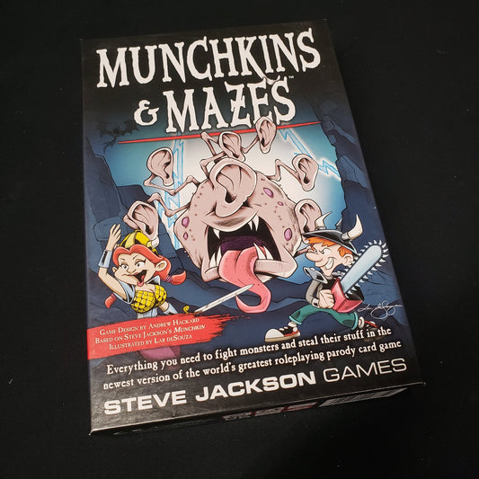 Image shows the front cover of the box of the Munchkins & Mazes card game
