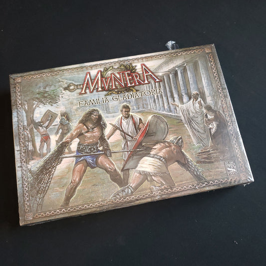 Image shows the front cover of the box of the MUNERA: Familia Gladiatoria board game