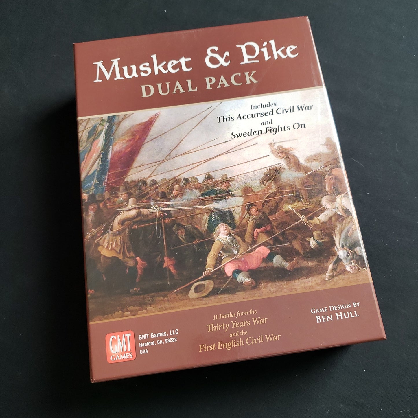 Image shows the front cover of the box of the Musket & Pike Dual Pack board game