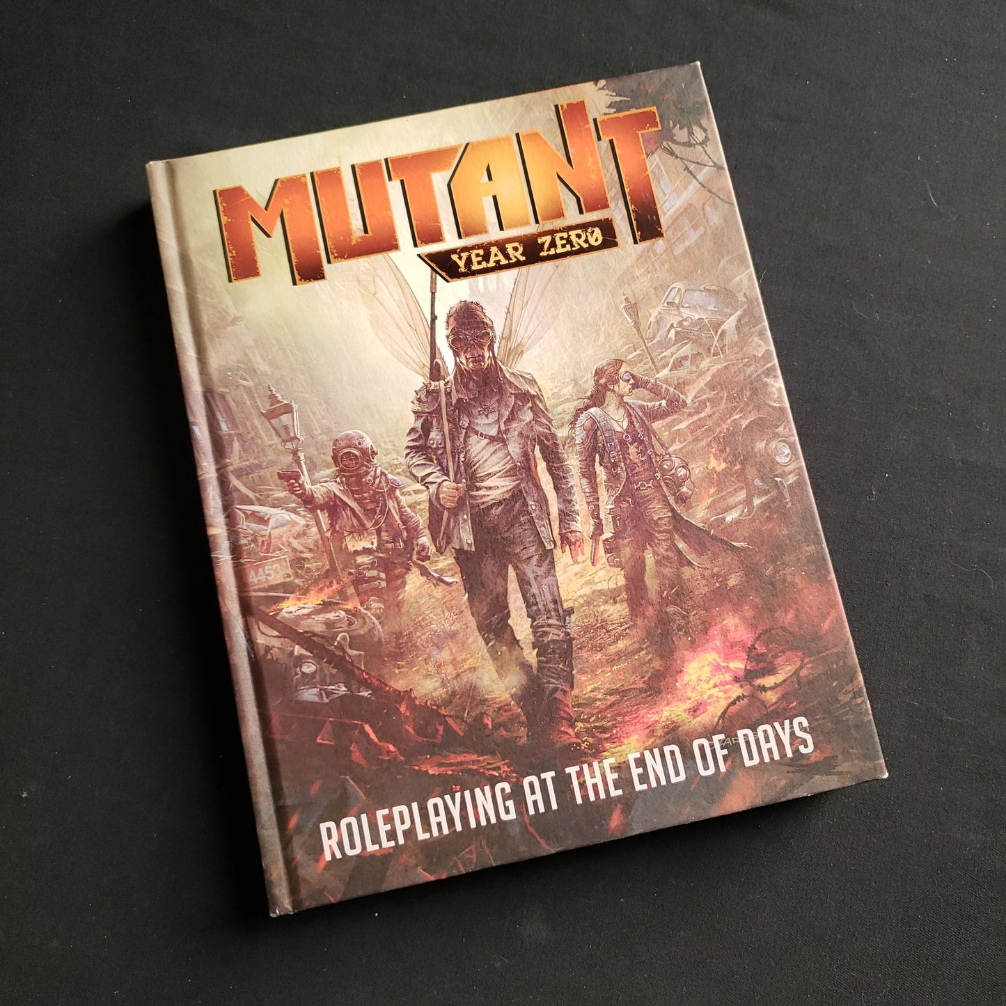 Image shows the front cover of the Core Rulebook for the Mutant: Year Zero roleplaying game