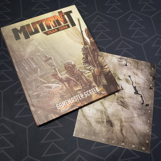 Image shows the front panel of the Gamemaster Screen for the roleplaying game Mutant: Year Zero along side a folded map