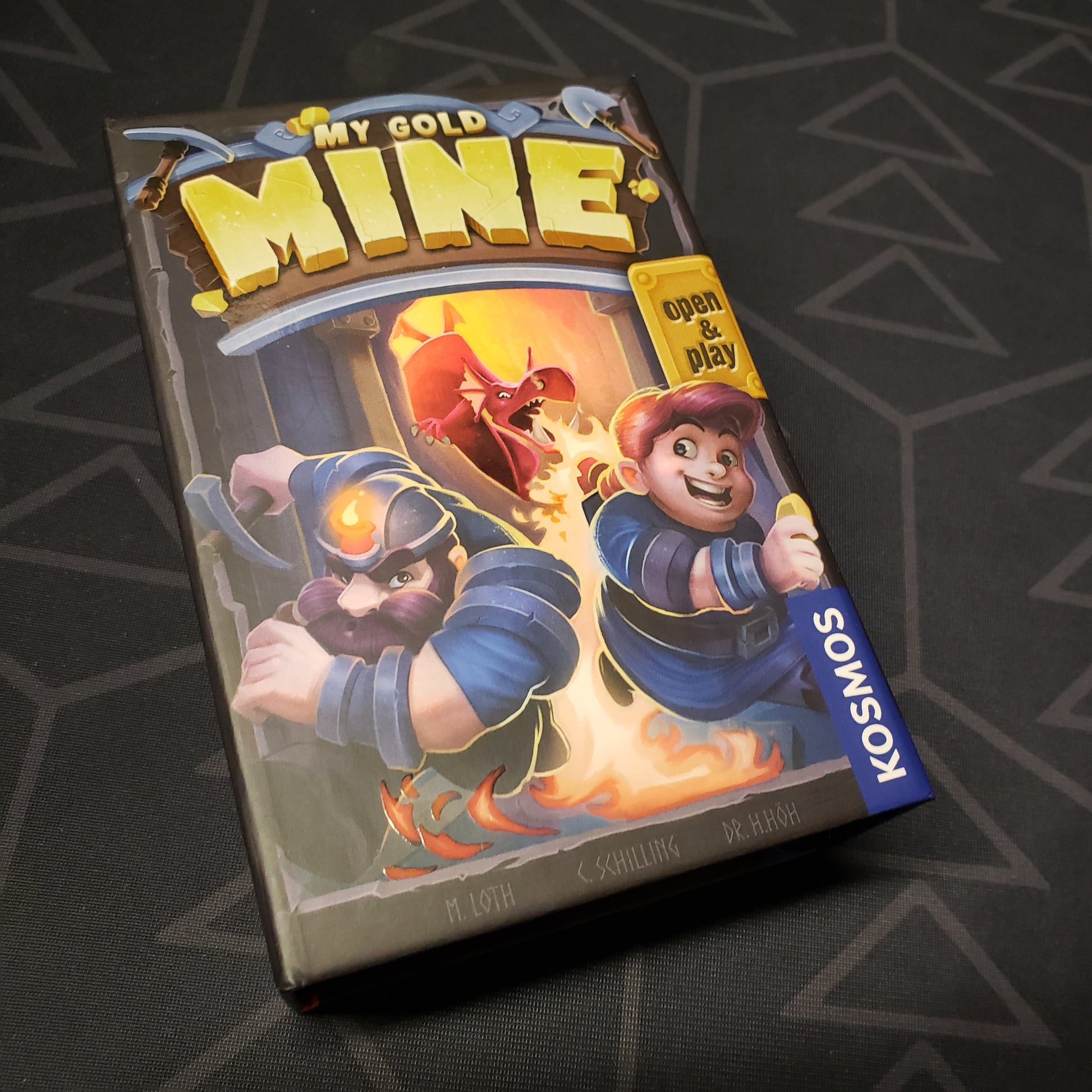 Image shows the front cover of the box for the My Gold Mine card game