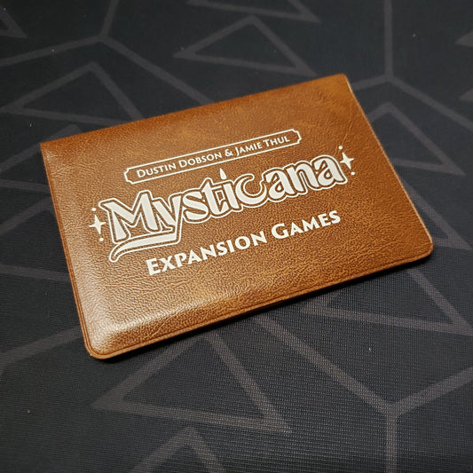 Image shows the front of the card wallet of the Expansion Games pack for the card game Mysticana