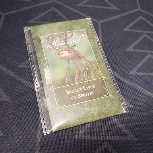 Image shows the front of the package of the Secret Lives of Sprites expansion for the board game Mythwind