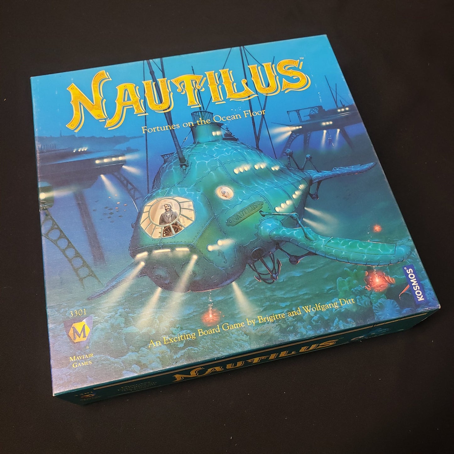 Image shows the front cover of the box of the Nautilus board game