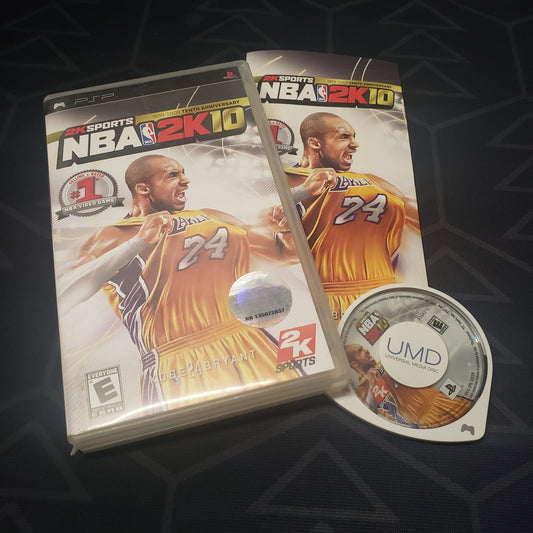 Image shows the case, manual and UMD disc for the video game NBA 2K10 for Playstation Portable