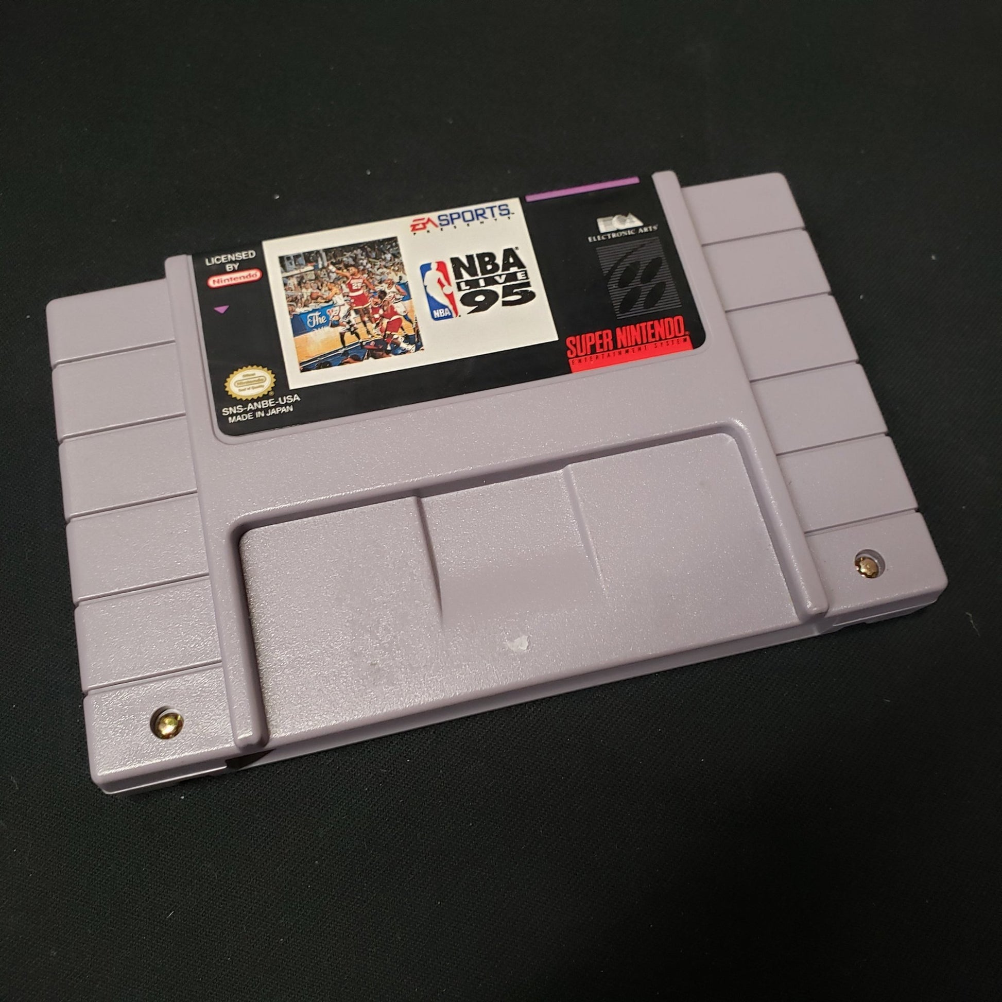 Image shows the front of the cartridge for the video game NBA Live ‘95 for Super Nintendo