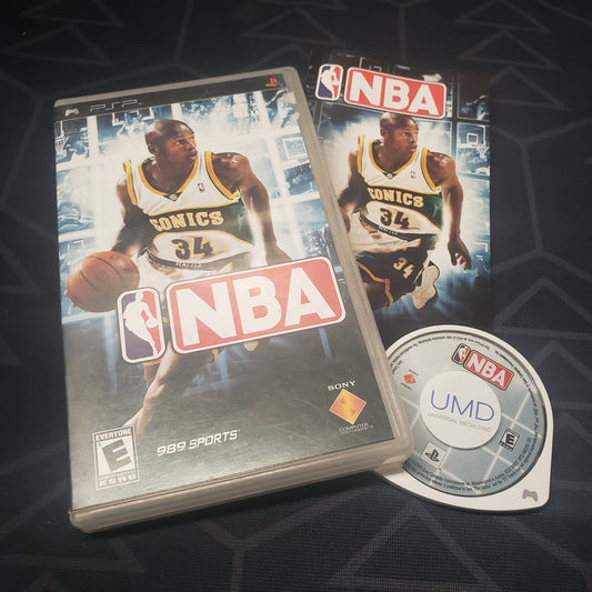 Image shows the case, manual and UMD disc for the video game NBA for Playstation Portable