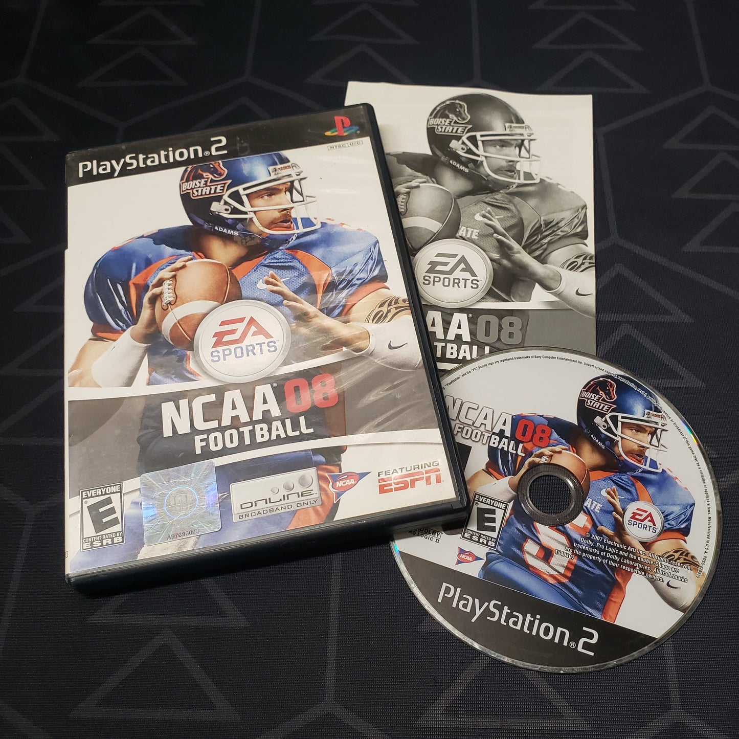Image shows the case, manual and disc for the video game NCAA Football 08 for Playstation 2