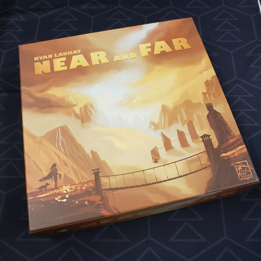 Image shows the front cover of the box of the Near and Far board game