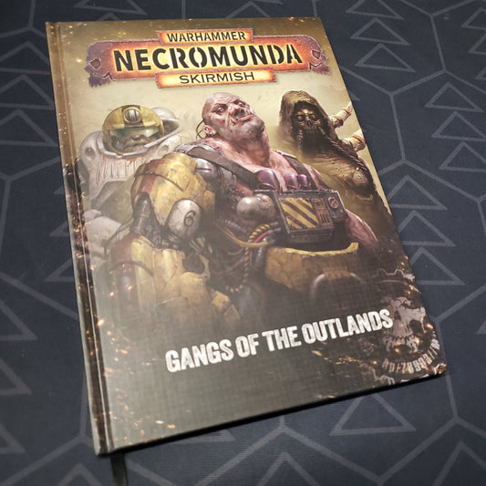 Image shows the front cover of the Necromunda Skirmish: Gangs of the Outlands wargaming book