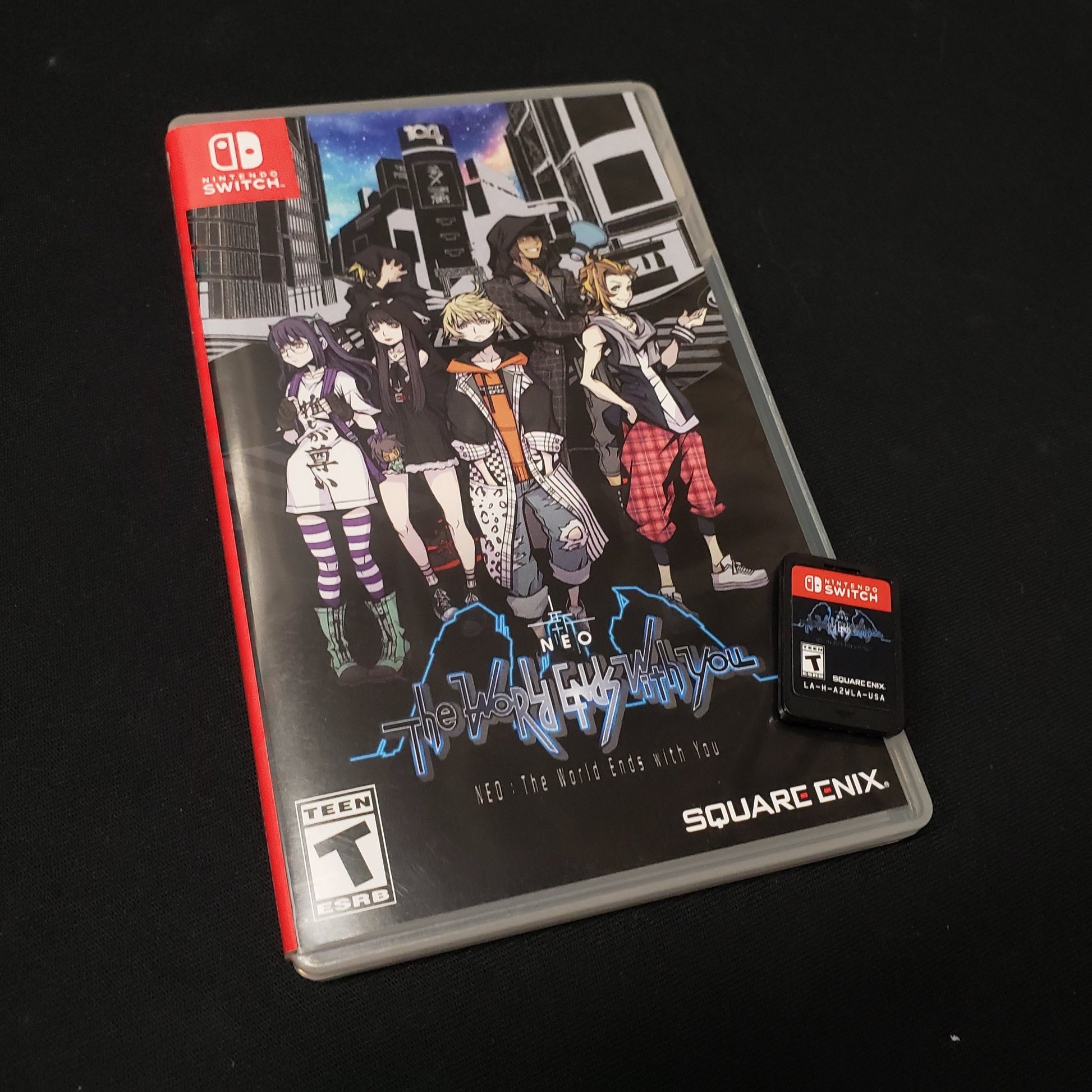 Image shows the case & cartridge for the video game NEO: The World Ends With You for Nintendo Switch