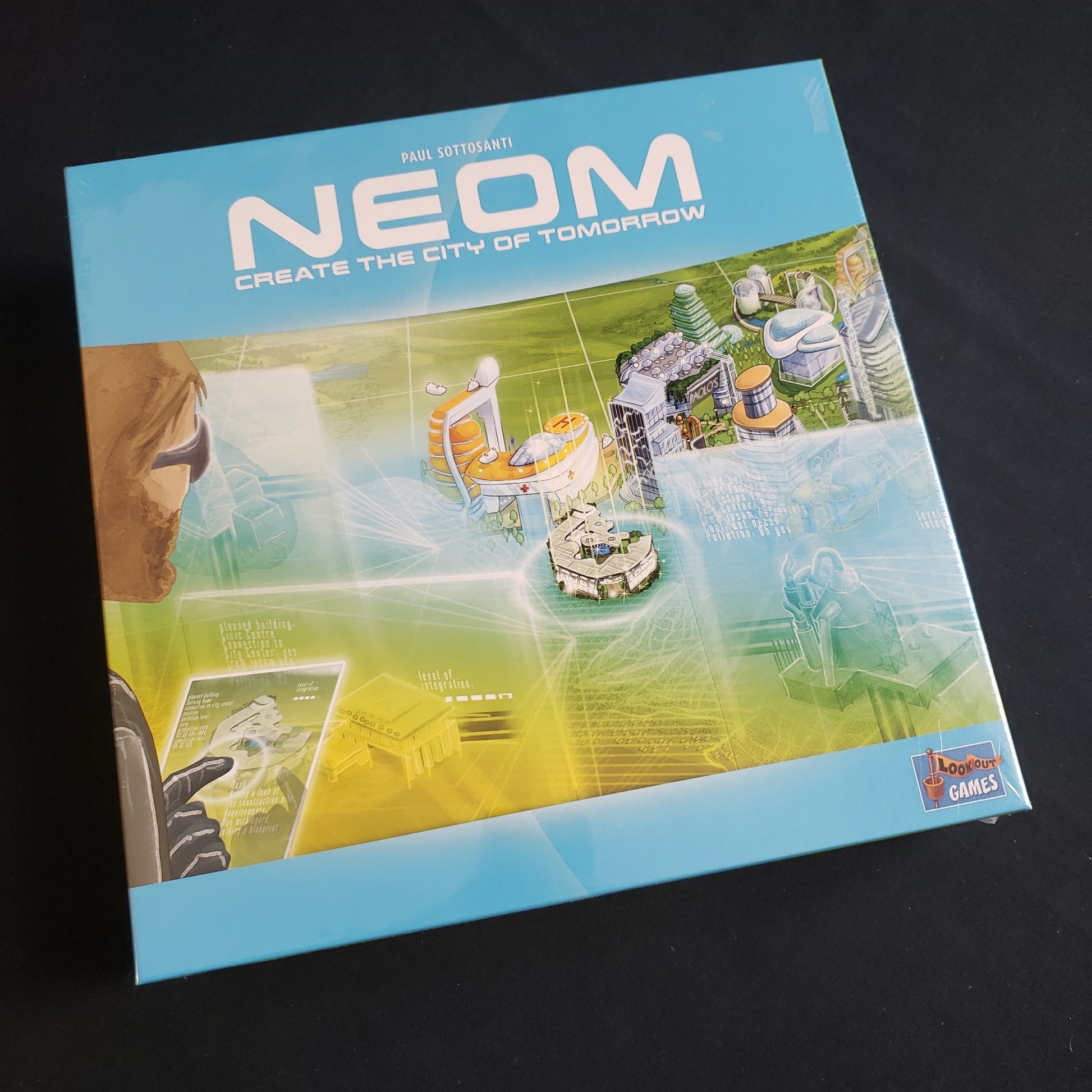 Image shows the front cover of the box of the NEOM board game
