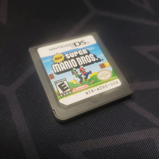 Image shows the front of the cartridge for the video game New Super Mario Bros. for Nintendo DS