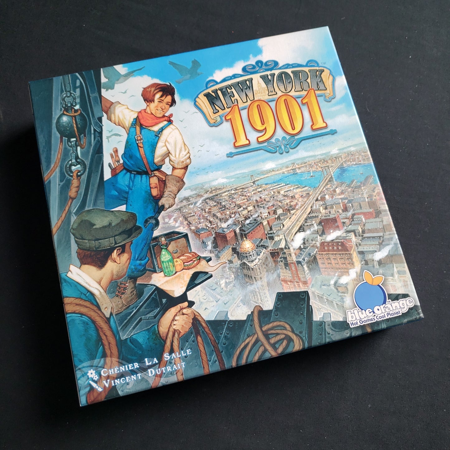 Image shows the front cover of the box of the New York 1901 board game